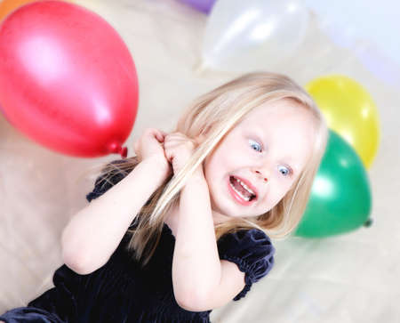 little girl with balloonsの写真素材