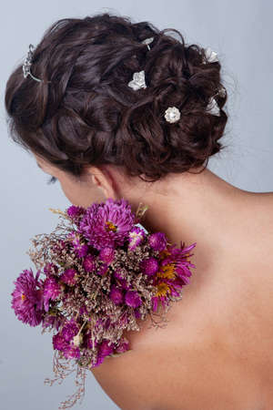 Girl with flowers photo in studio