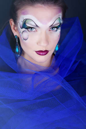 Girl with painted faceの写真素材