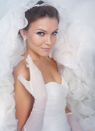 Brunet bride portrait in studioの写真素材