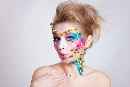 Girl with painted faceの写真素材