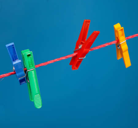color clothespins on the ropeの写真素材