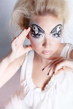 Girl with painted faceの写真素材