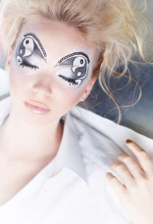 Girl with painted faceの写真素材
