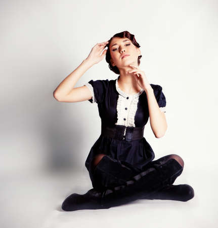 Beautiful brunette girl photo in studioの写真素材