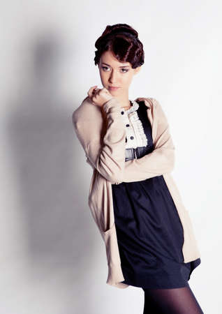 Beautiful brunette girl photo in studioの写真素材