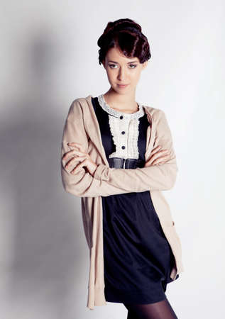 Beautiful brunette girl photo in studioの写真素材