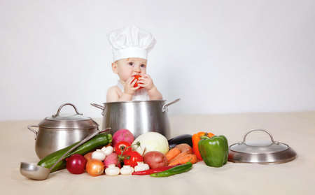 Little baby cook in studioの写真素材