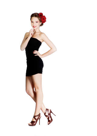 Beauriful smiling girl in short black dressの写真素材