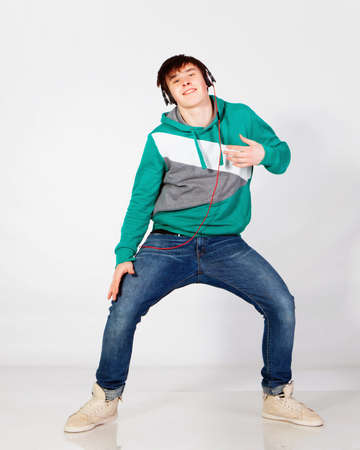 Young man dancing in studioの写真素材