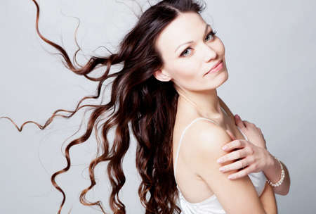 Beauriful brunette girl portrait in studioの写真素材