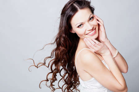 Beauriful brunette girl portrait in studioの写真素材