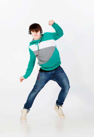 Young man dancing in studioの写真素材