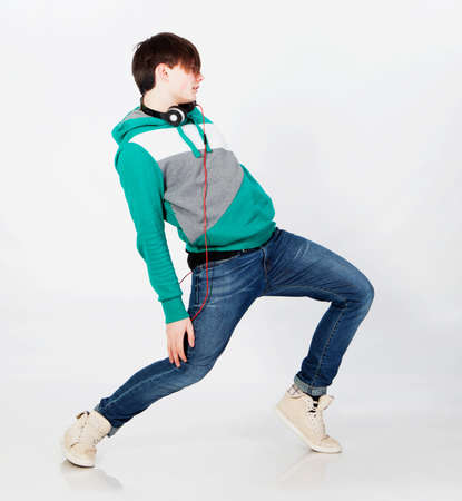 Young man dancing in studioの写真素材