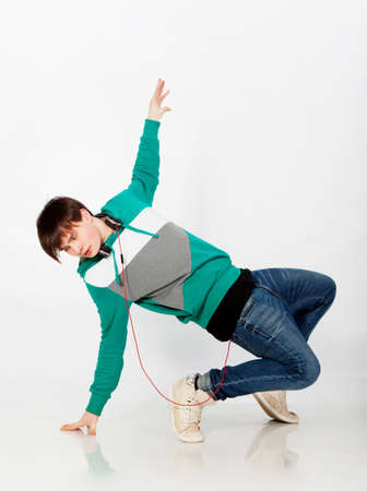 Young man dancing in studioの写真素材