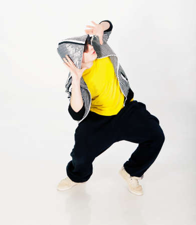 Young man dancing in studioの写真素材