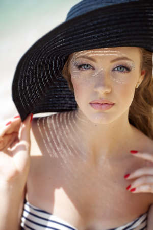 beautiful blonde on the beachの写真素材