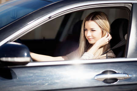 Beautiful girl in the carの写真素材