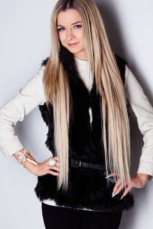 Sexy young lady with blond hair in studioの写真素材