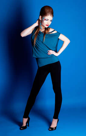 Girl with fantasy make-up in studioの写真素材