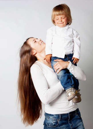 Mother with son in studioの写真素材