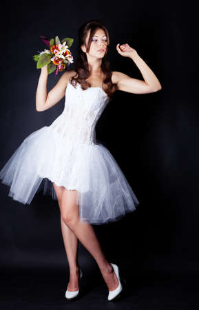 Bride portrait in studio on black backgroundの写真素材