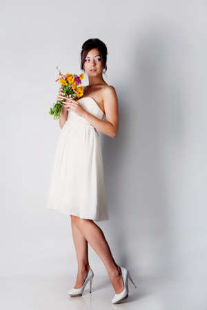 Bride portrait in studio on white backgroundの写真素材