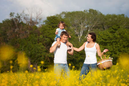 Family on the flower meadow