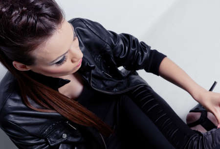 Beautiful girl with hairstyle portrait in studioの写真素材