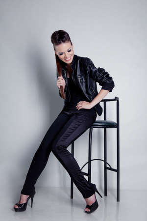 Beautiful girl with hairstyle portrait in studioの写真素材
