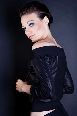 Beautiful girl with hairstyle portrait in studioの写真素材
