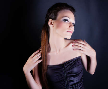 Beautiful girl with hairstyle portrait in studioの写真素材