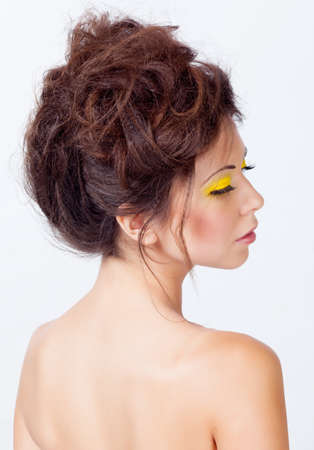 Woman with bright makeup isolated on whiteの写真素材