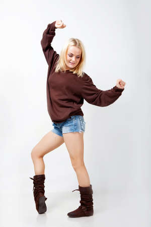 Beautiful girl dancing hip-hop in studioの写真素材