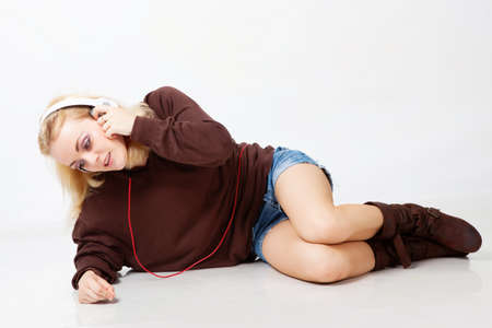 Girl listening misic in studioの写真素材