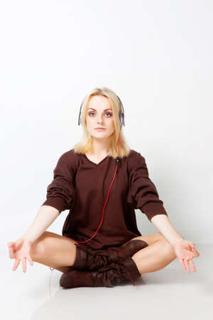 Girl listening misic in studioの写真素材