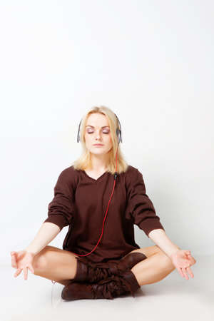 Girl listening misic in studioの写真素材