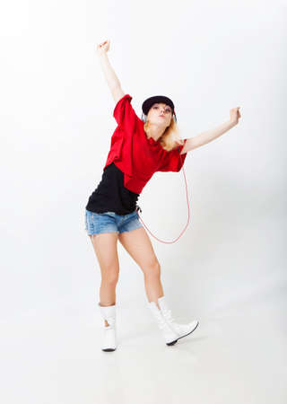 Beautiful girl dancing hip-hop in studioの写真素材
