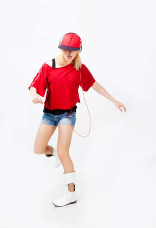 Beautiful girl dancing hip-hop in studioの写真素材