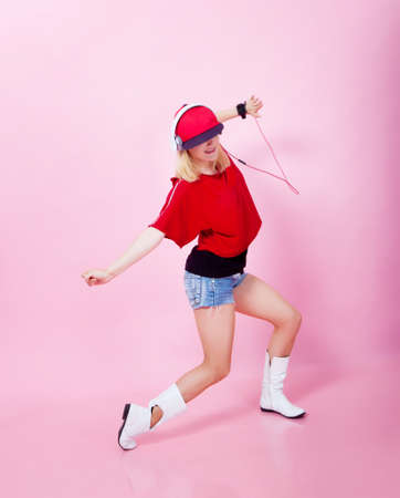 Beautiful girl dancing hip-hop in studioの写真素材