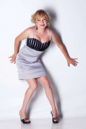 elegant lady posing in the studio. full-lengthの写真素材