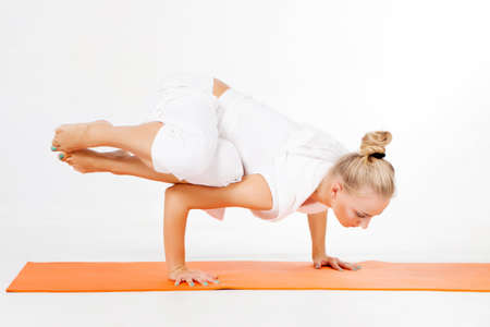 Young woman doing yoga exerciseの写真素材