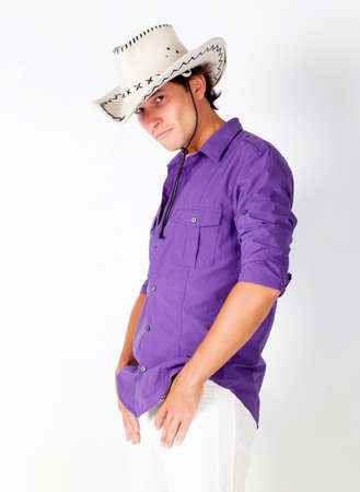 Young man in cowboy hat portrait isolated on whiteの写真素材