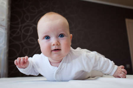 Infant boy laying at homeの写真素材