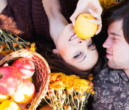 Two lovers on picnic in gardenの写真素材