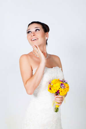 Beautiful brunette bride portrait in studioの写真素材