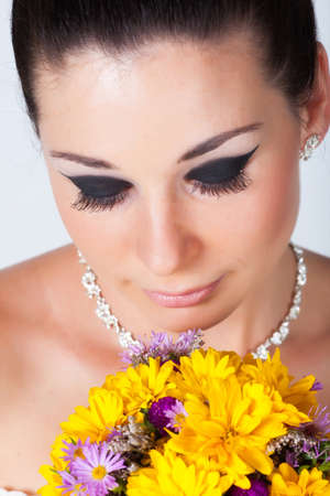 Beautiful brunette bride portrait in studioの写真素材