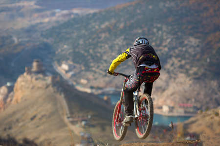 SEVASTOPOL, UKRAINE - NOVEMBER 25: Unknown racer on the competition of the mountain bike "Listopad Bike Session 2012" on November 25, 2012 in Sevastopol, Ukraineのeditorial素材