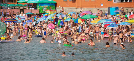 ALUSHTA, JULY OF 2012. People on the city beach.  11 of july 2012 Alushta, Ukraineのeditorial素材