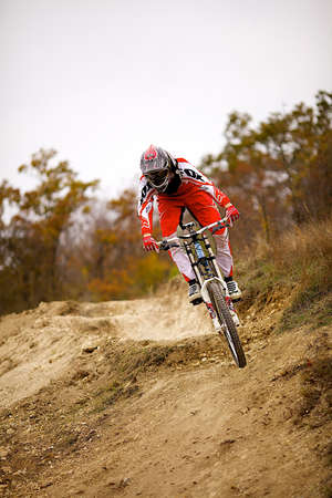 SEVASTIPOL, UKRAINE - NOVEMBER 3. Racer Denis Bauzin on competition of mountain bike "Listopad bike session 2011" on november 3, 2011 in Sevastopol, Ukraineのeditorial素材
